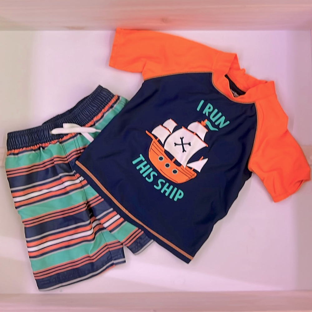 Carter’s bright Orange & Blue pirate ship bathing-suit